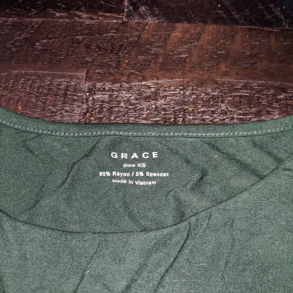 Quarter length emerald top